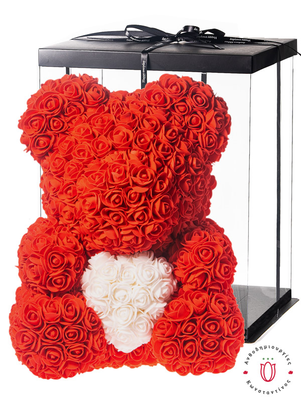 Teddy bear with red roses and white heart in a luxury gift box. The best Valentine's Day gift