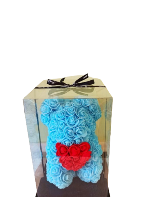 αρκουδάκι με γαλάζια τριαντάφυλλα και κόκκινη καρδιά σε κουτί δώρου